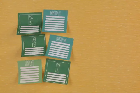 Post-it notes arranged on a yellow surface