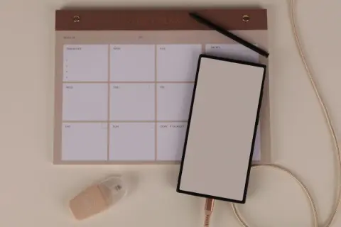 A weekly planner on a desk